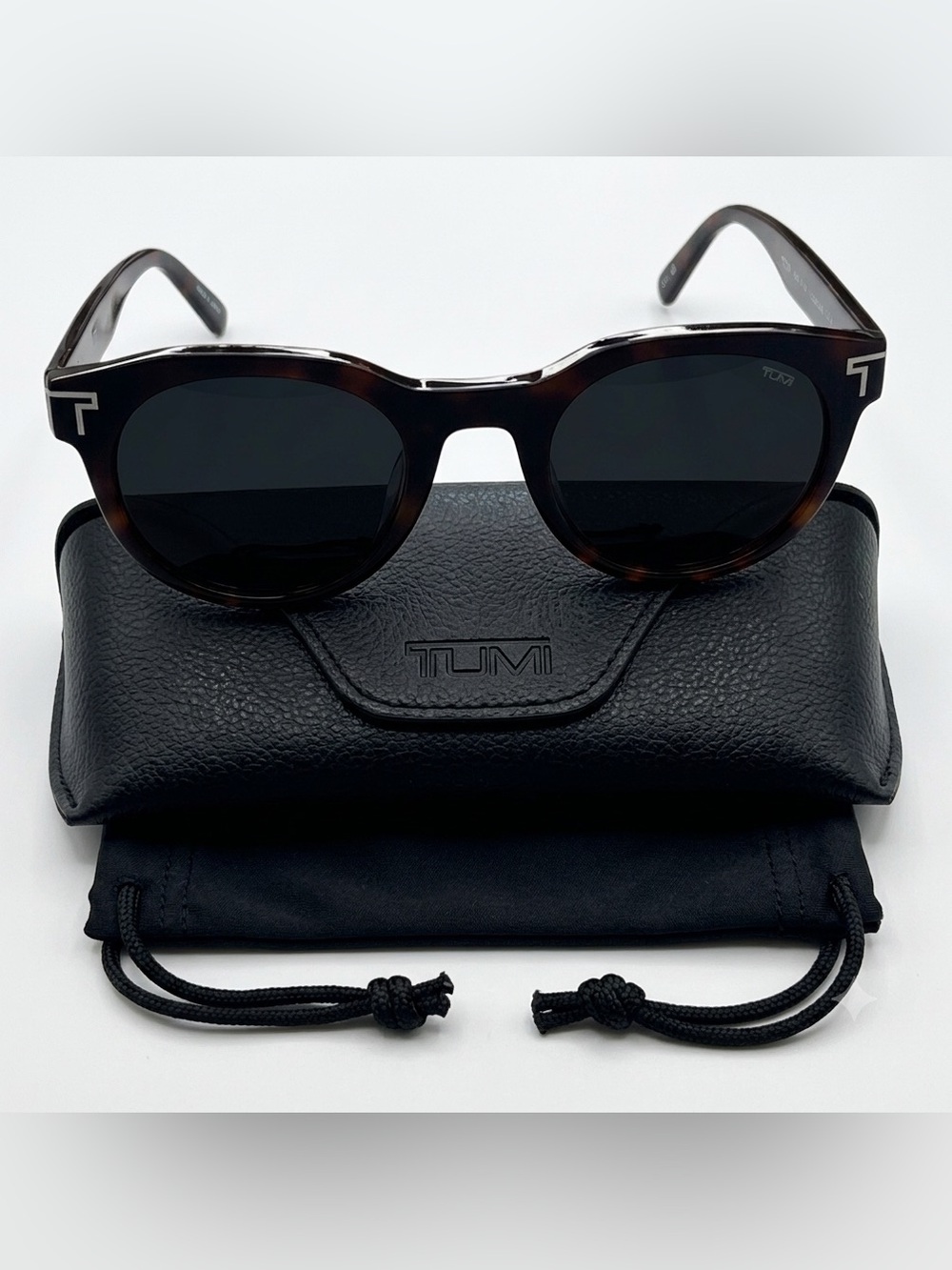 Tumi Women's Black Sunglasses with Dark Lenses. Soft Pouch & Hard Case